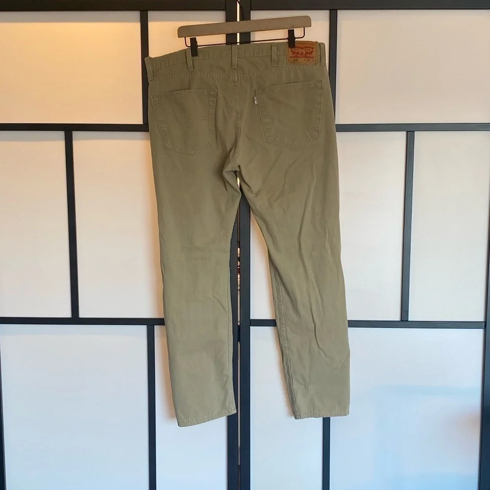 Levi's 502 tan pants. Size 36. HEMMED‎